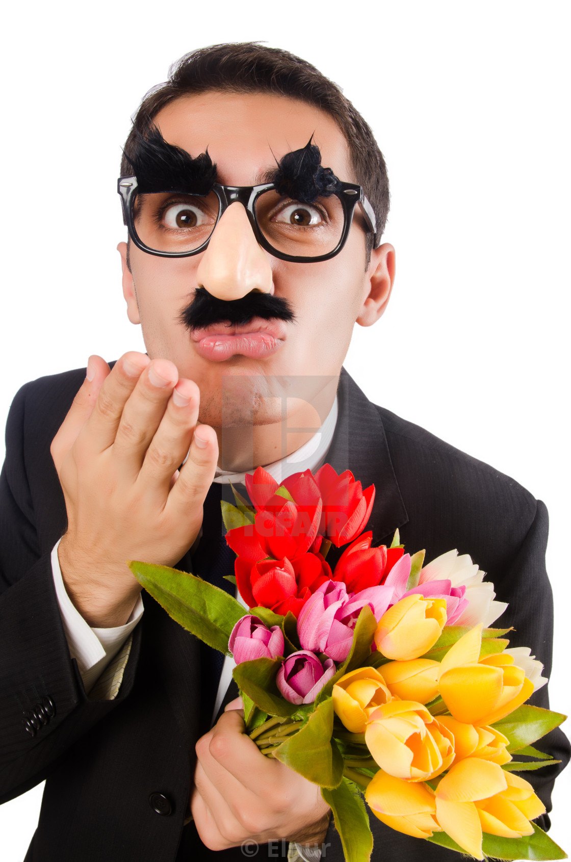 Смешной мужчина с цветами
