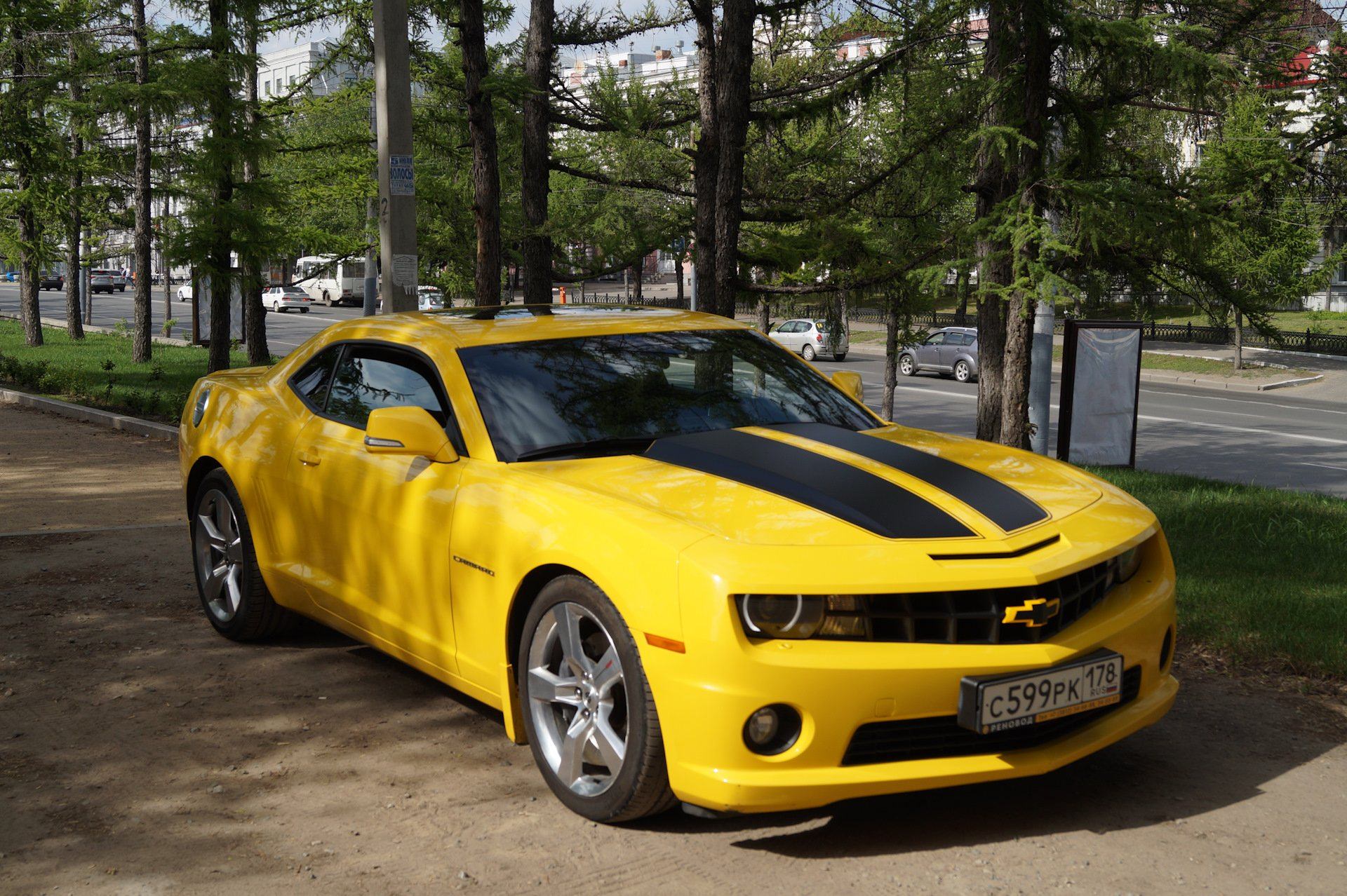 Шевроле камаро желтая. Chevrolet Camaro 2022 Yellow. Шевроле Камаро 2023 желтая. Chevrolet Камаро желтый.